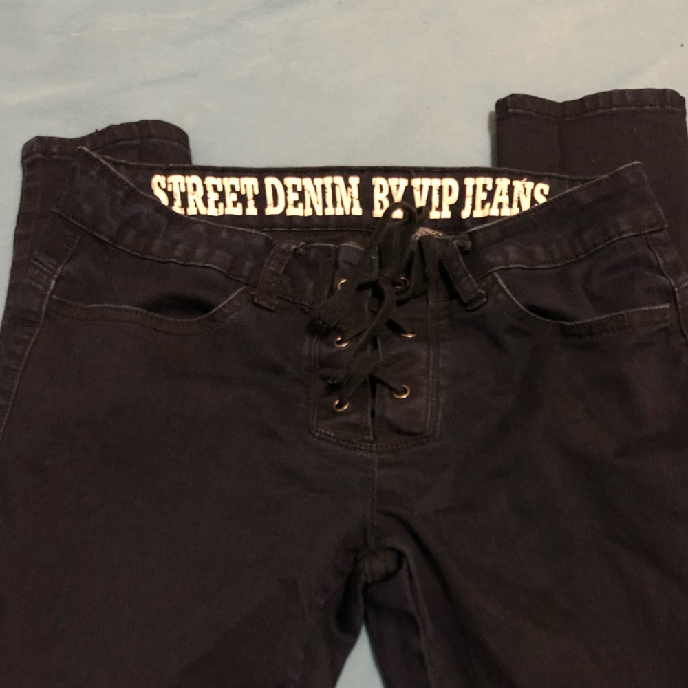 Lace up dark blue jeans